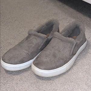 Grey slip on shoes with fur